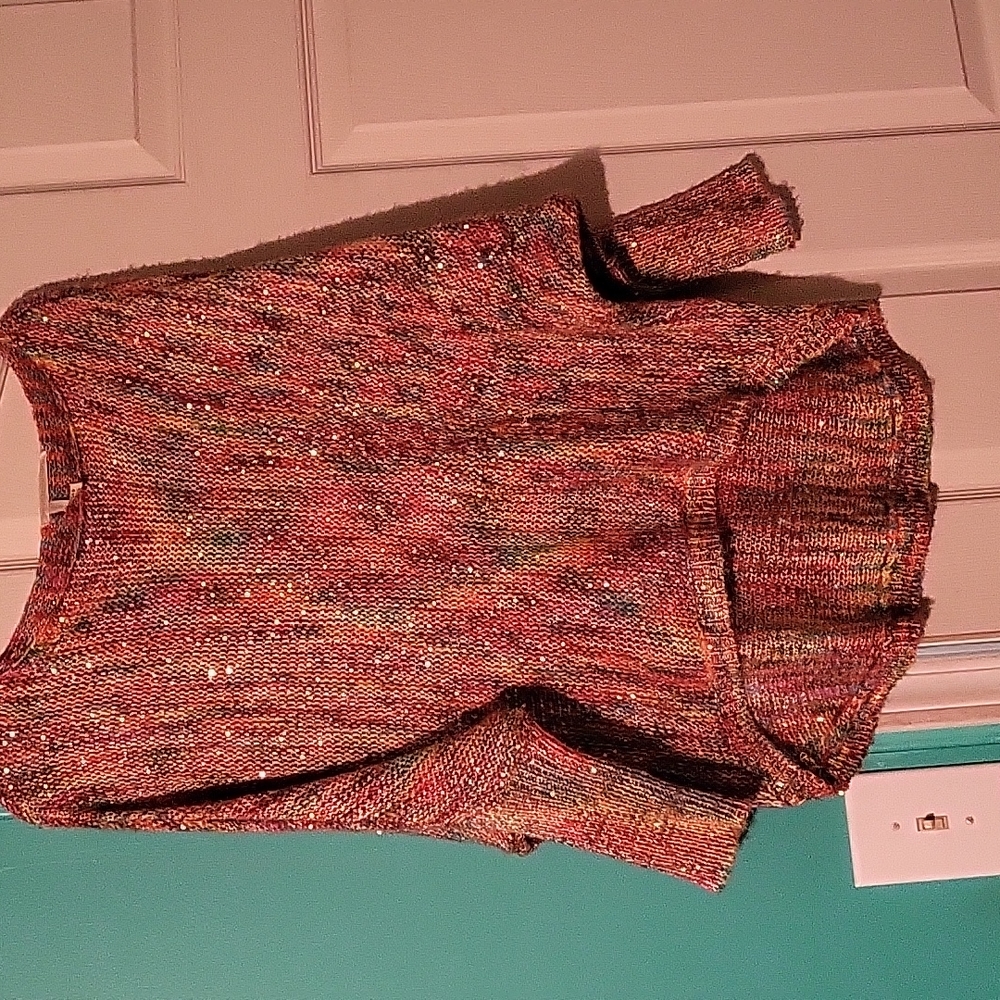 A rainbow sparkly sweater